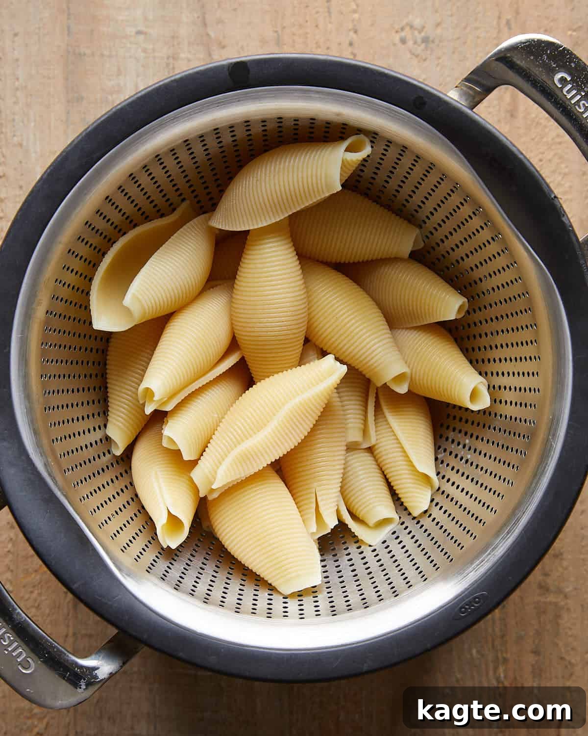 Boiled jumbo pasta shells prepared for baked stuffed shells, cooked until al dente and ready to fill.