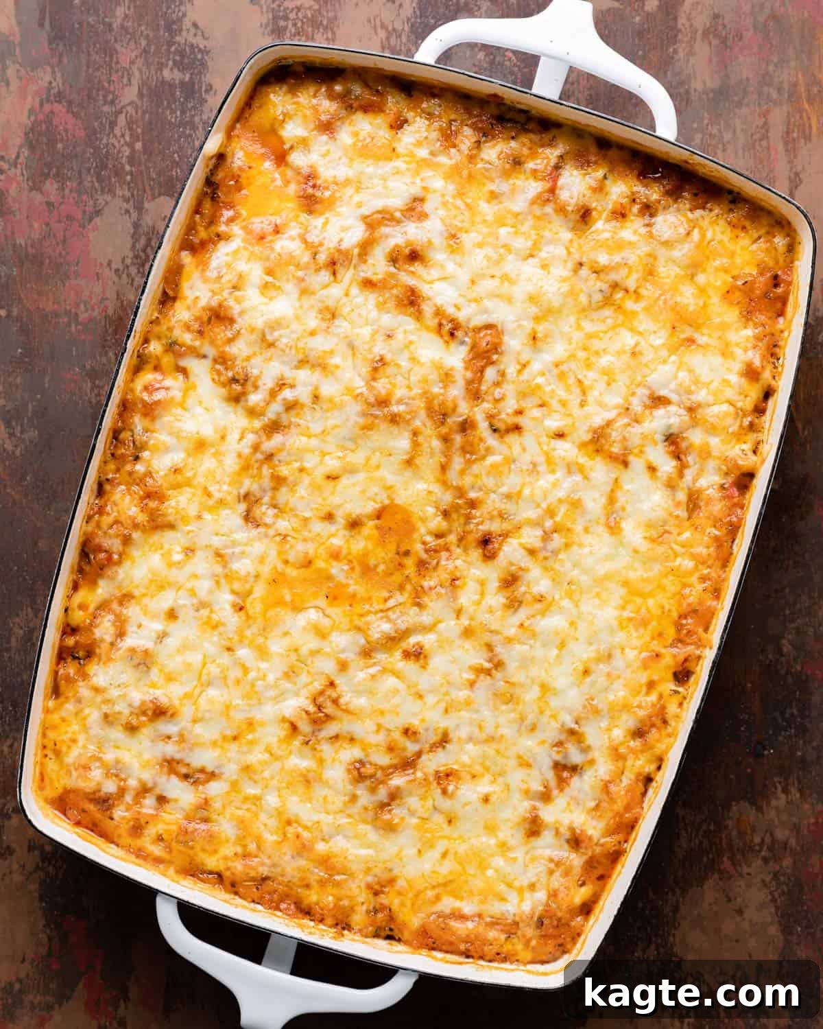 Overhead image of spaghetti squash casserole in white baking dish. 