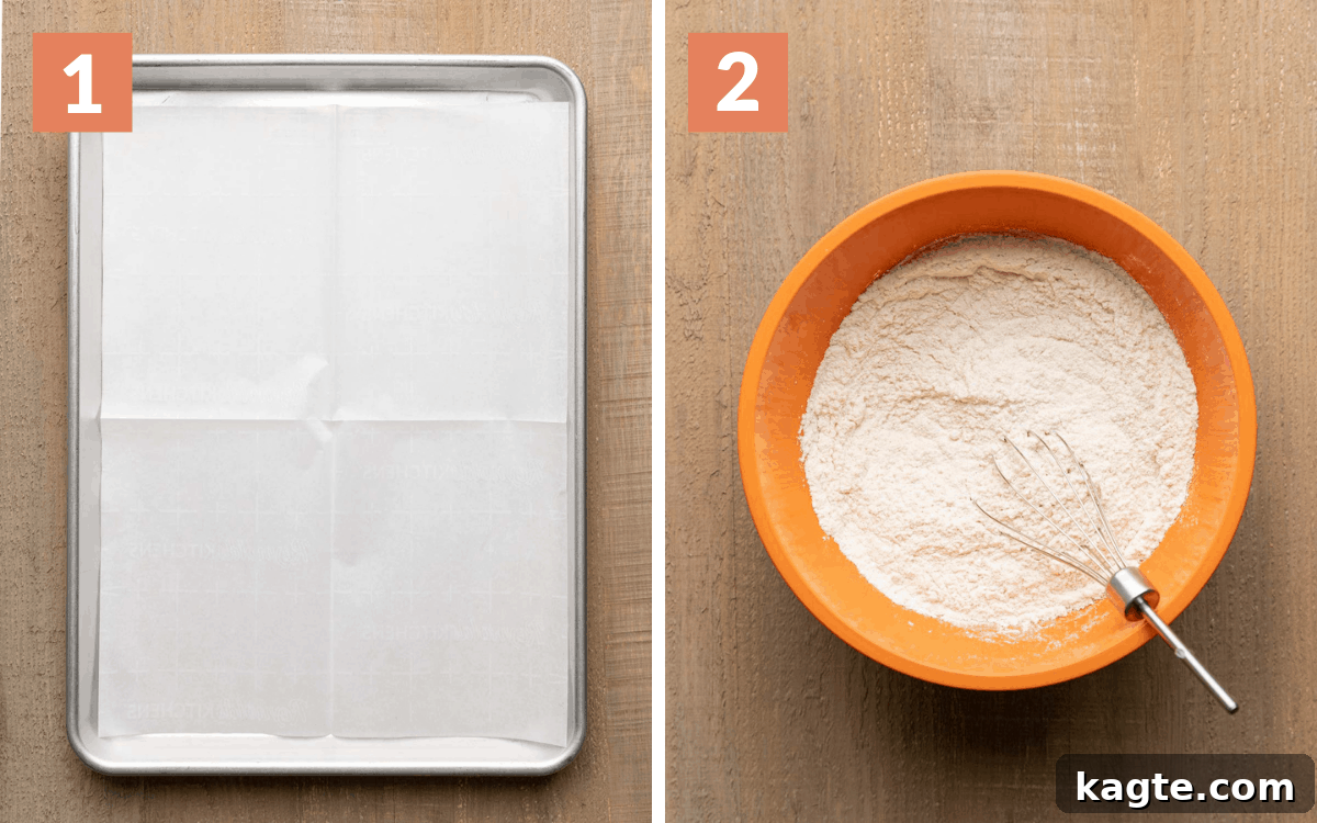 Effortless Dairy-Free Drop Biscuits 4 A baking pan lined with parchment paper and a bowl containing whisked dry ingredients for biscuits.