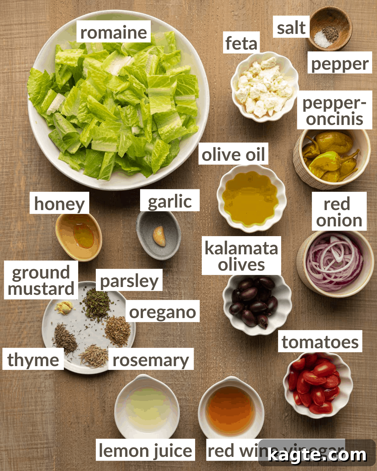 Overhead image of ingredients needed to make Panera Greek salad copycat, neatly arranged.