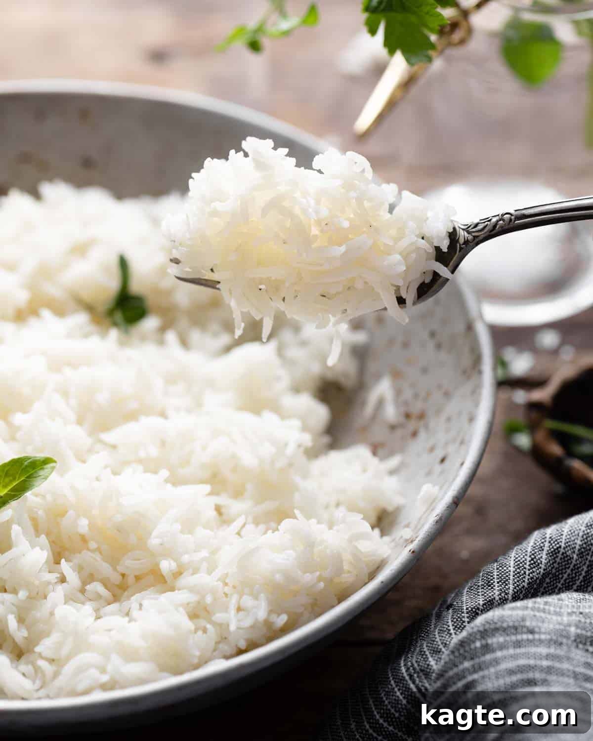 Perfect Instant Pot Basmati Rice 6 Close-up of perfectly cooked Instant Pot basmati rice on a fork, showing its fluffy and separate grains.