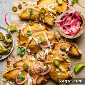 Finished Baked Cilantro Lime Chicken Tacos on a baking sheet, ready to serve.