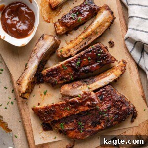 Fall-Off-The-Bone St Louis Ribs Oven Masterpiece 8 Perfectly caramelized St. Louis Ribs served on a platter.