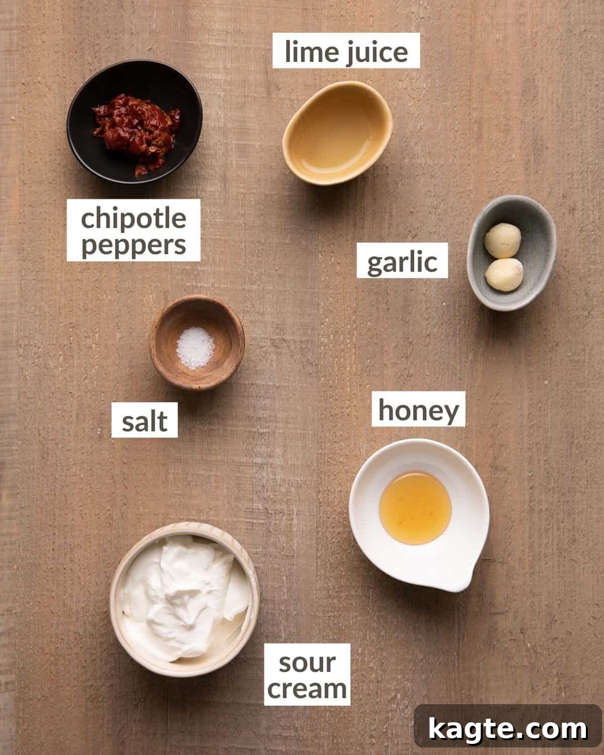 Smoky Chipotle Lime Crema 3 Overhead shot of ingredients for chipotle crema in bowls.