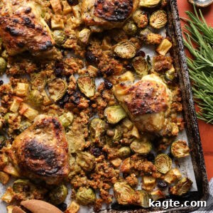 Sheet Pan Roasted Chicken with Herb Stuffing 9 Maple Dijon chicken thighs surrounded by roasted stuffing, Brussels sprouts, apples, and cranberries.